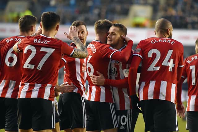 Sheffield United captain Bully Sharp says the fans are an inspiration as his team mates prepare for this evening's visit to Aston Villa: Robin Parker/Sportimage