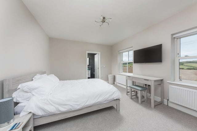 A generous double bedroom with lovely views.
