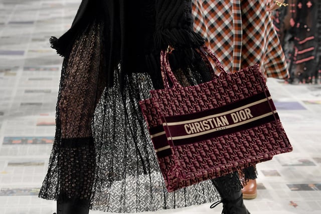 PARIS, FRANCE A model (bag detail) walks the runway during the Dior show as part of the Paris Fashion Week Womenswear Fall/Winter 2020/2021 on February 25, 2020