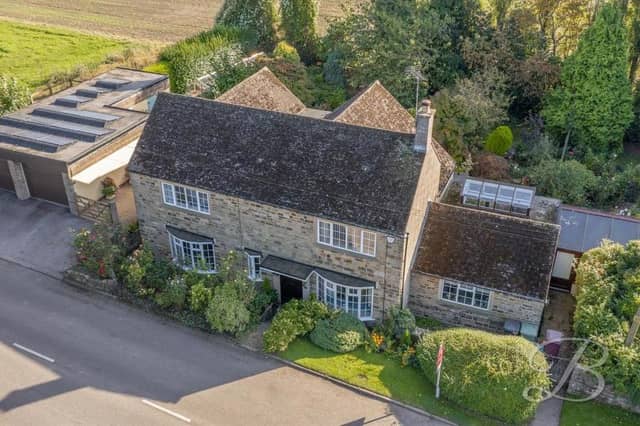 An aerial view of the majestic property on Mansfield Road at Heath, near Chesterfield. It boasts four bedrooms, two bathrooms and five reception rooms.