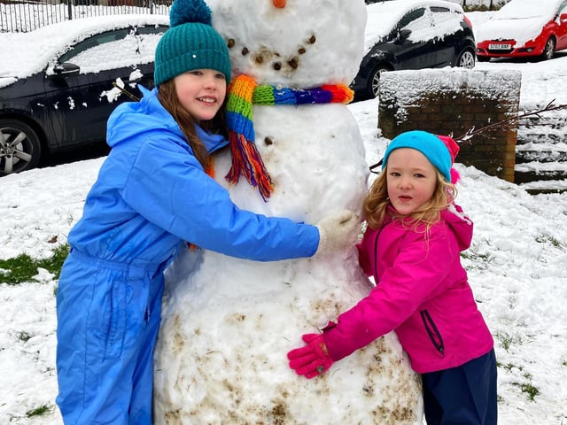 Maisie (age 9) and Belle (age 5) built a giant snowman in Arbourthorne (Photo: Mel Mycroft).