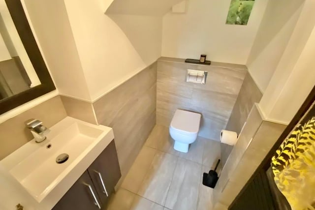 The coach-house annexe has two shower rooms. Here is the first, with shower enclosure, wash basin and low-flush WC