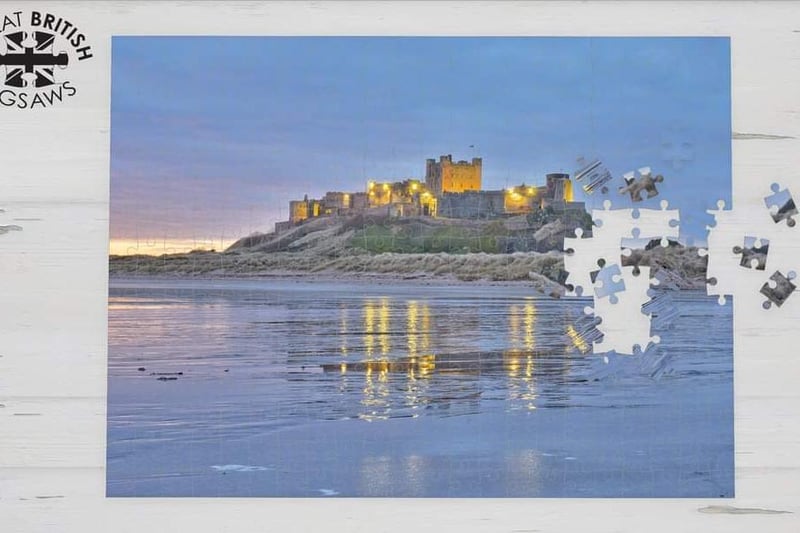 A scenic view of Bamburgh Castle taken from the beach.