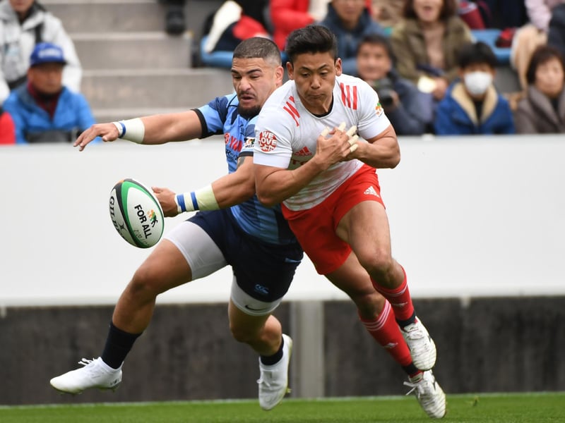 Sione Tuipulotu, pictured left in action for Yamaha Jubilo against Toyota Verblitz in the Japanese Top League, is 24 and qualifies for Scotland through his Glaswegian grandmother. The Aussie-born back will join Glasgow Warriors in the summer. He played previously for Melbourne Rebels in Super Rugby before moving to Japan.