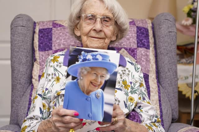 100 year old Mabel Ash with her telegram from the Queen. Picture Scott Merrylees