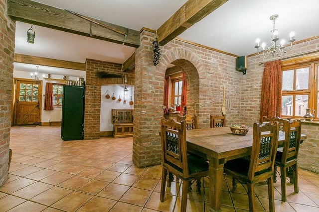 A cute breakfast/dining area, just off the kitchen. Nearby is a utility or laundry room too, plus a downstairs WC with cloakroom.