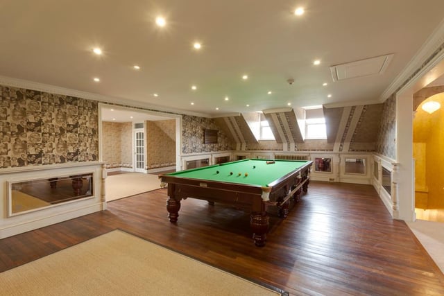 Perfect for entertaining, the games room comes complete with a full-sized snooker table.