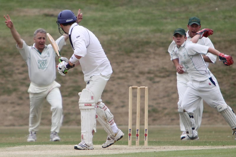 Buxton CC celebrate early wickets against Woodley.
