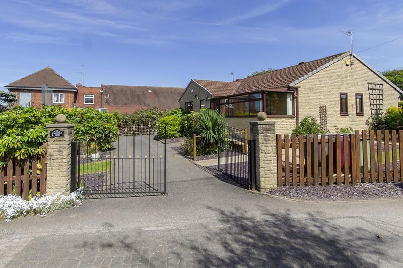 Zoopla says: "The property sits on a generous corner plot, having double gates opening onto a tarmac drive providing ample off-street parking and leading around to an attached single garage."