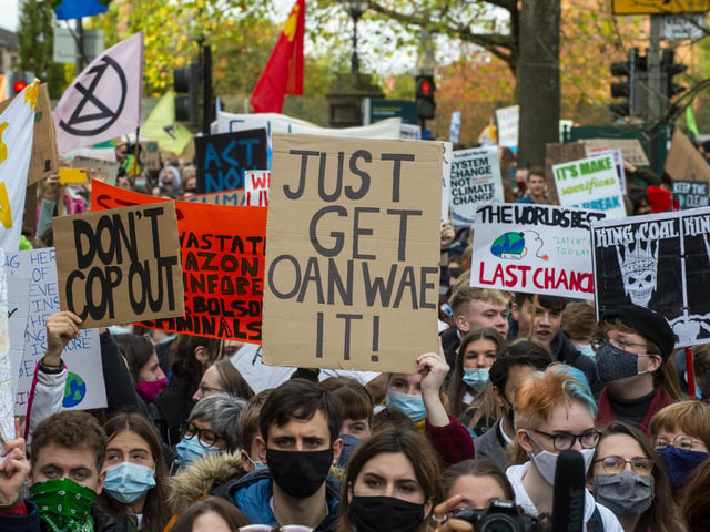 The frustration of one Scottish protester was made clear by their sign, which simply said: 'Just get oanwae it'!