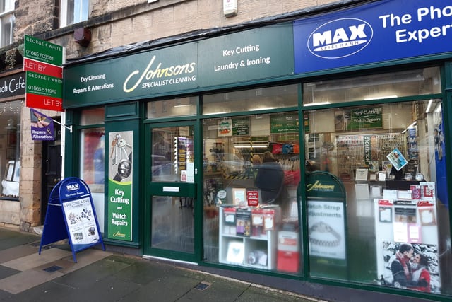 Johnsons, the dry cleaning specialist, is open.