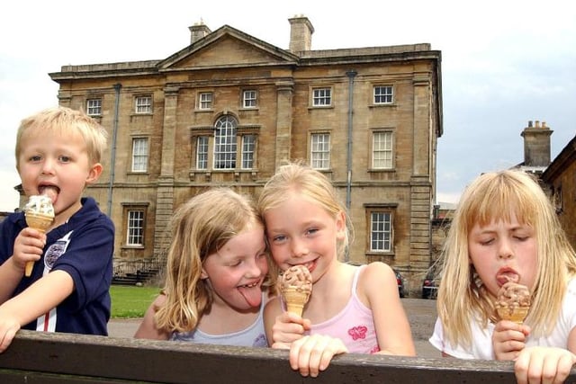 Taken in 2004 these children are enjoying ice cream in front of the hall on a hot Summer's day. Left to right: Marcus Charnock, aged 5 from Balby. Sarah Roche, aged 7 of Skellbrooke. Annabelle Owen, aged 7 from Sprotbrough. Lucy Charnock, aged 7 from Balby.