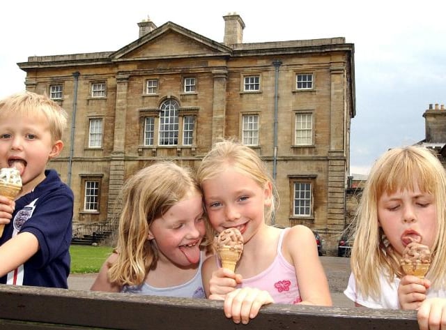Taken in 2004 these children are enjoying ice cream in front of the hall on a hot Summer's day. Left to right: Marcus Charnock, aged 5 from Balby. Sarah Roche, aged 7 of Skellbrooke. Annabelle Owen, aged 7 from Sprotbrough. Lucy Charnock, aged 7 from Balby.