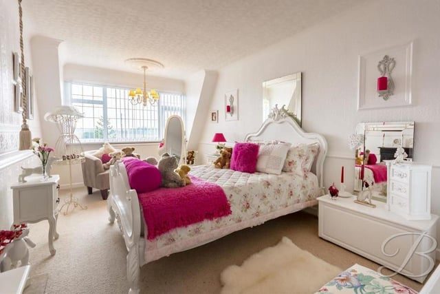 This is the biggest of the three bedrooms at the £400,000 property. The floor is carpeted and the window overlooks the front.
