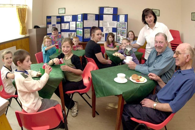Members of the Southey Community take advantage of the new Four Greens Cafe on Southey Avenue which opened 20 years ago