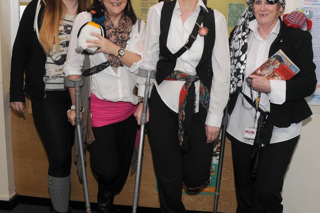 The finance department at Balby Academy, Doncaster dressed up as characters from Treasure Island for World Book Day in 2014