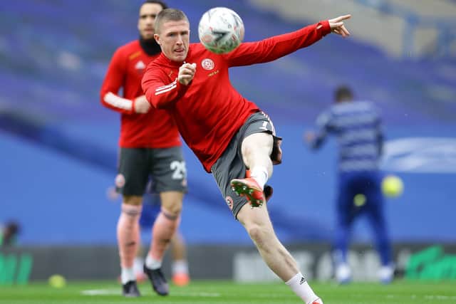 John Lundstram warms up before Sheffield United's visit to Chelsea in the FA Cup: David Klein/Sportimage