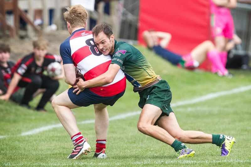 Hawick's Morgan Tait gets to grips with a Peebles player (Pic: Bill McBurnie)