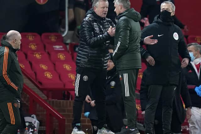 Ole Gunnar Solskjaer manager of Manchester United with Chris Wilder manager of Sheffield Utd during the Premier League match at Old Trafford, Manchester. Picture date: 27th January 2021. Picture credit should read: Andrew Yates/Sportimage