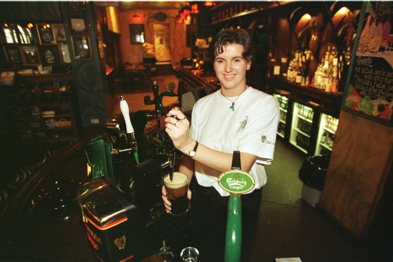 Fibber Magees won the Evening News Pub of the year in 1996. Bar person Katherline Guthrie is pictured pulling a pint.