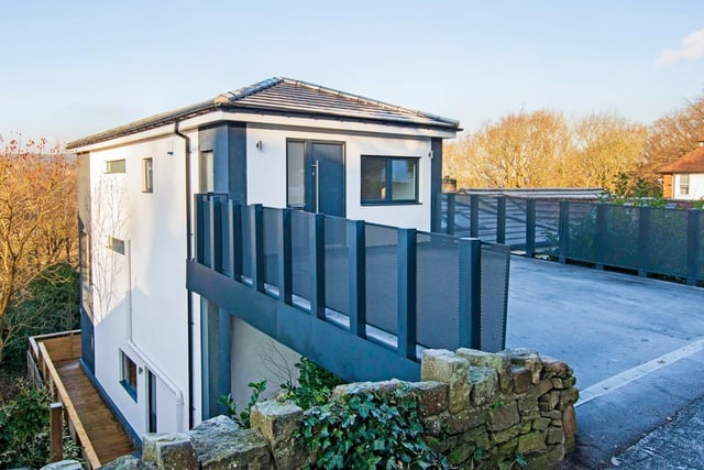 The estate agent says the house has a 'one of a kind contemporary design'.
