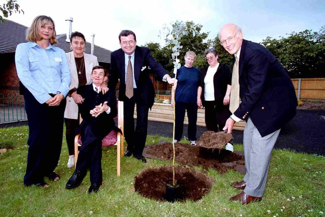 Mike Ellis of Westfield Healthcare Scheme planted a new tree in the Westfield sponsored sensory garden  at St.Catherines Hospital Doncaster in 1999 L -r.. Sharon Marsden,Joan Leighton and brother Charlie Swales, Liam hayes ( Trusts Chief Exec), Vicky Lymbury, Jill Parker, Mike Ellis (Westfield)