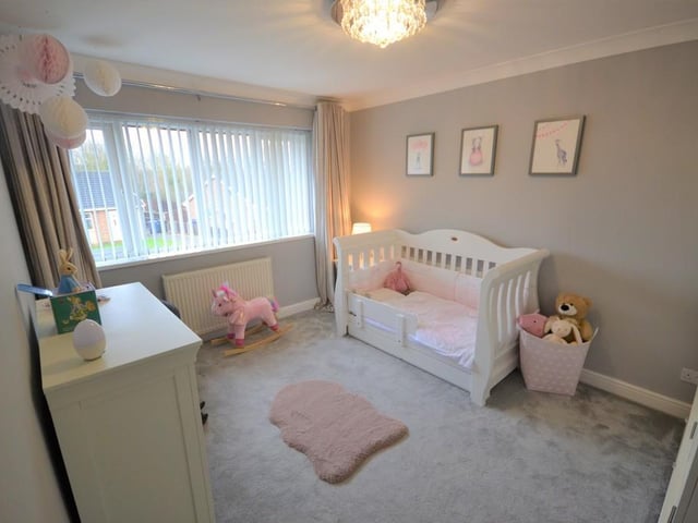 A well presented double bedroom enjoying a pleasant outlook form a rear facing double glazed window. Having various power sockets, provisions for a wall mounted television, central heating radiator and coving complements the ceiling.