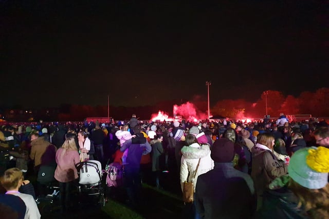 The packed crowds waiting for the touchpaper to be lit on the fireworks display