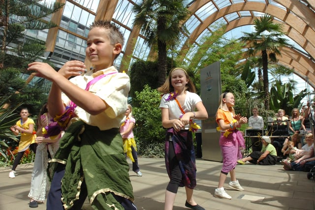 Birley Primary school children Bollywood dancing in the Winter Gardens as part of the Childrens Festival in 2007