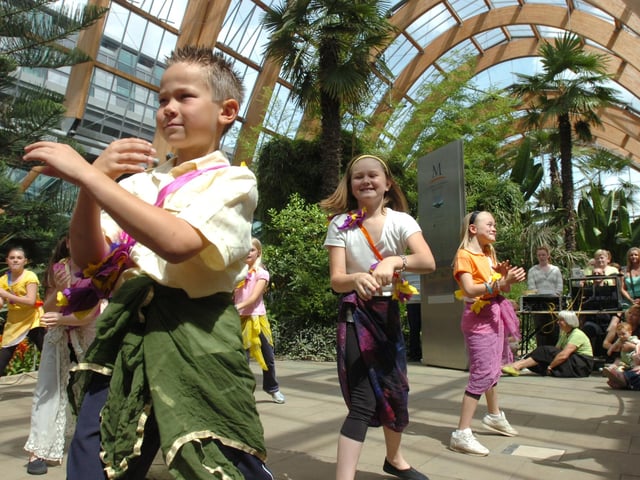 Birley Primary school children Bollywood dancing in the Winter Gardens as part of the Childrens Festival in 2007
