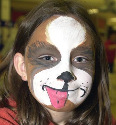 Rachel Fenn aged eight with her face painted like a cute dog. Doncaster Racecourse 2000.
