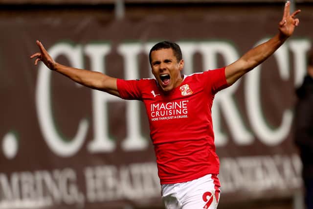 Swindon Town's Tyler Smith, on loan from Sheffield United,  celebrates after scoring the winning goal in injury time against Oxford United at Kassam Stadium on Saturday. (Photo by Getty Images/Getty Images)