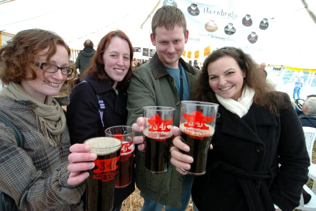 Grace Corbett, Davina Craps,  Brent Guffrey and Sarah Hope enjoy a pint at the 34th Steel City Beer Festival at Cemetery Park in October 2008