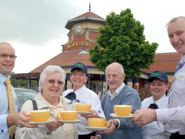 Norma, second, left and Frank Bell, third right, take a cup of tea to launch the Morrison's Charity of the year Help the Aged and Childline at the Bulwell store in 2008. Also pictured from the left are; John Buttler, Store Manager , Pam Simpson, cafe supervisor, Wendy Salmon, Cafe Manager and Graham Hare, Deputy Store Manager