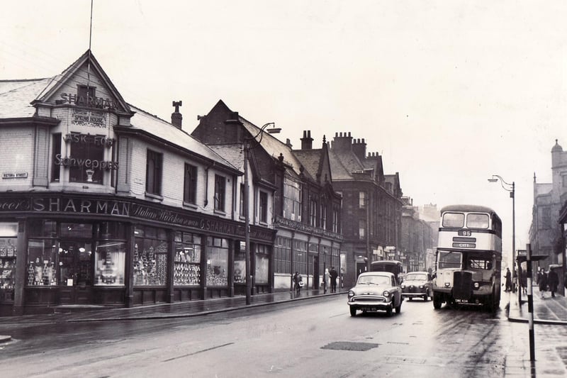 West Street, Sheffield in January 1961. Caption reads "The junction of West Street with Fitzwilliam Street - an illustration of a self-contained shopping centre, away from mid-city bustle, yet with stores to meet virtually every demand of the housewife and her family"