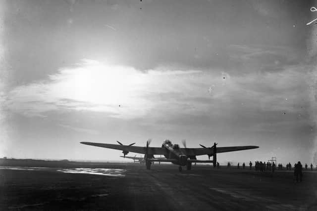 circa 1940:  A Lancaster bomber taking off at dusk.  (Photo by Central Press/Getty Images)