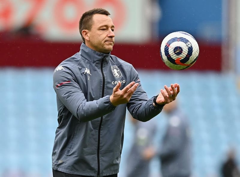 John Terry, former assistant head coach of Aston Villa warms his side up prior to the Premier League match between Aston Villa and Chelsea at Villa Park on May 23, 2021 in Birmingham, England.