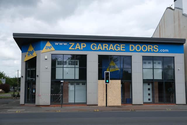 The shopfront of Zap Garage Doors in Attercliffe was damaged in the crash.