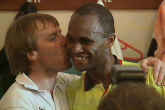 A peck on the cheek from Dave Bassett for Tony Agana!