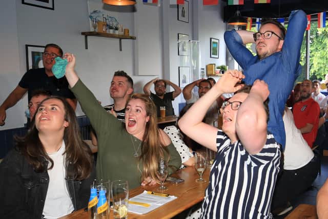 Fans watch England beat Germany in Euro 2020 at Two Thirds Beer Co in Sheffield. Picture: Chris Etchells