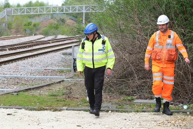 Network Rail and British Transport Police check on signalling cables alonside tracks in Sheffield. The number of cases of cable thefts across South Yorkshire, which officials say is being hit hardest nationally, has soared this month.