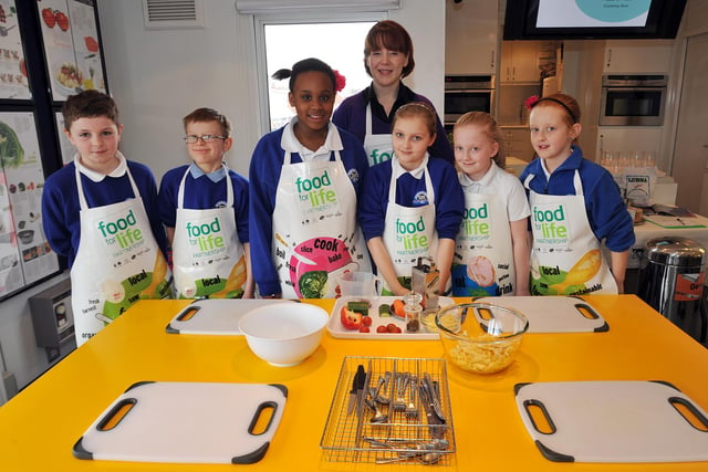 Children of Norbridge Primary School helped to cook a meal for members of the Balmoral Centre on the Cooking Bus, part of the Food For Life scheme in 2011