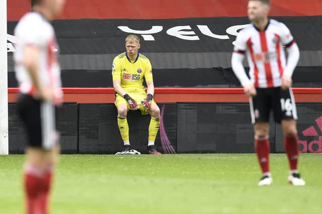 Sheffield United goalkeeper Aaron Ramsdale sits dejected at an empty Bramall Lane: Peter Powell/PA Wire.