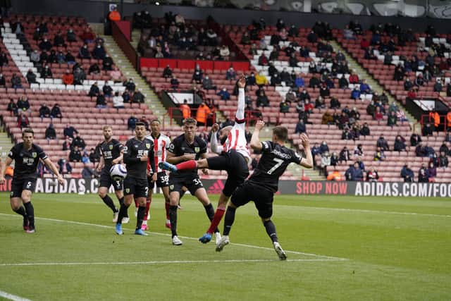 Sheffield, England, 23rd May 2021. David McGoldrick of Sheffield Utd scores the first goal during the Premier League match at Bramall Lane, Sheffield. Picture credit should read: Andrew Yates / Sportimage