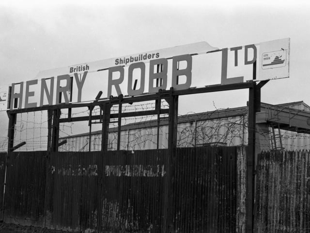 The sign above shipbuilders Henry Robb Ltd shipyard at Leith docks, November 1981.