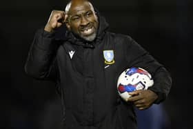 A delighted Owls boss Darren Moore at the final whistle   Pic Steve Ellis