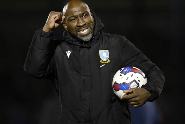 A delighted Owls boss Darren Moore at the final whistle   Pic Steve Ellis