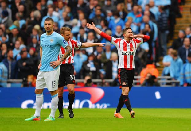 LONDON, ENGLAND - MARCH 02:  Fabio Borini of Sunderland celebrates scoring the opening goal during the Capital One Cup Final between Manchester City and Sunderland at Wembley Stadium on March 2, 2014 in London, England.  (Photo by Michael Regan/Getty Images)