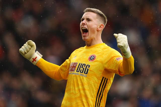 SHEFFIELD, ENGLAND - FEBRUARY 22: Dean Henderson of Sheffield United celebrates his sides first goal  during the Premier League match between Sheffield United and Brighton & Hove Albion at Bramall Lane on February 22, 2020 in Sheffield, United Kingdom. (Photo by Richard Heathcote/Getty Images)