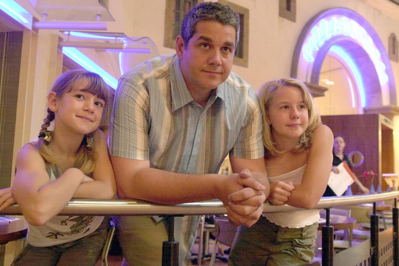 Brian Lambert in casual wear with daughters Alice, left, and Phillipa in June 2003